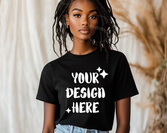 May include: A black t-shirt with the text "YOUR DESIGN HERE" in white lettering. The shirt is being worn by a person with long dreadlocks.