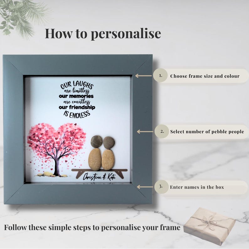 May include: A framed artwork with a gray border features a heart-shaped tree with pink leaves. Two pebble figures sit on a bench. The text reads "OUR LAUGHS are limitless, our memories are countless, our friendship IS ENDLESS."