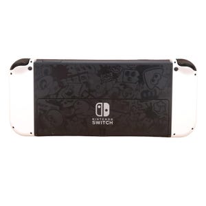 May include: White Nintendo Switch console with a black backplate featuring a graffiti-style design. The Nintendo Switch logo is visible in the centre of the backplate.