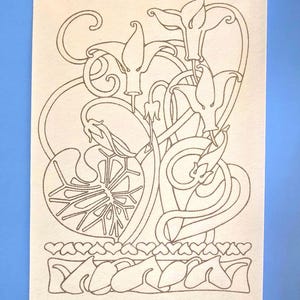May include: A detailed line drawing of stylized flowers and leaves on a textured off-white paper. The design features swirling lines, heart shapes, and floral elements, all in a brown color. The artwork is set against a light blue background.