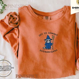 Off To Commit Shenanigans Embroidered Wizard Raccoon Comfort Colors Sweatshirt