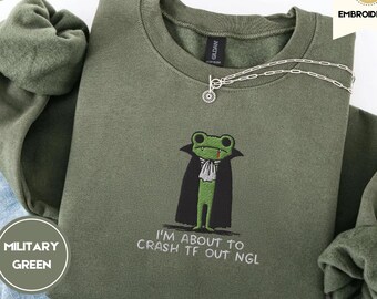 Sudadera con cuello redondo bordada divertida de "Estoy a punto de estrellarme con la rana vampiro" de TF
