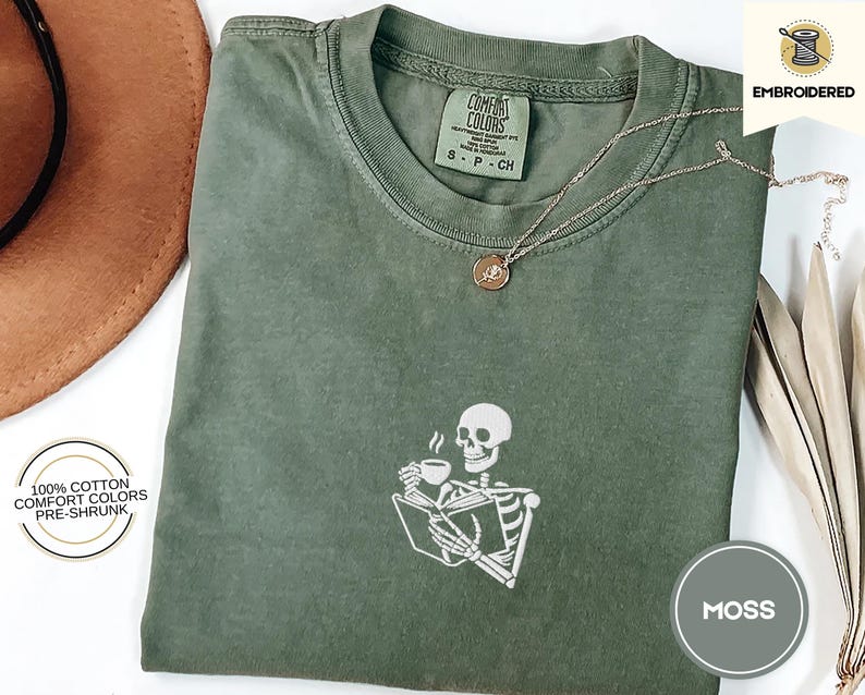 Embroidered Skeleton Reading a Book Shirt – Comfort Colors Book Lover Tee Cozy Aesthetic Embroidery Dark Academia Spooky Season Reader Shirt