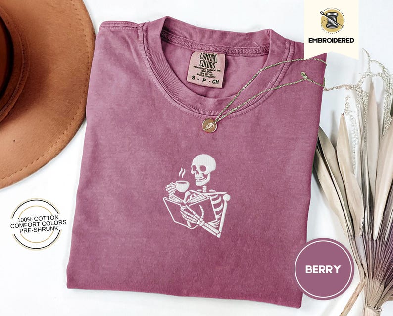 Embroidered Skeleton Reading a Book Shirt – Comfort Colors Book Lover Tee Cozy Aesthetic Embroidery Dark Academia Spooky Season Reader Shirt