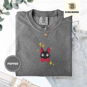 Jiji Anime Cat Embroidered Tee – Comfort Colors® Kawaii Cozy Shirt, Studio-Inspired Witchy Cat Gift, Cute Magical Familiar Tee
