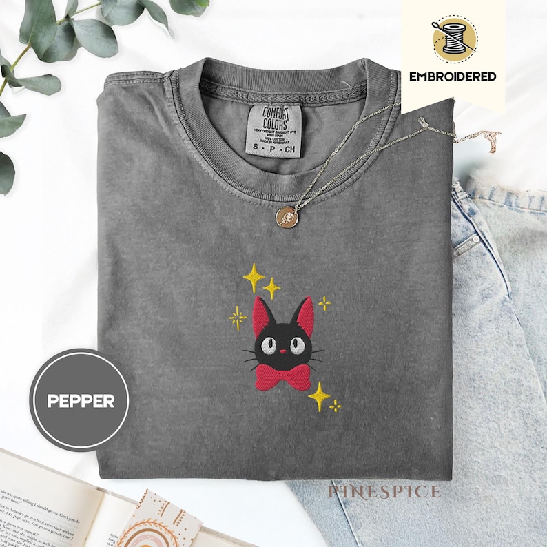 Jiji Anime Cat Embroidered Tee – Comfort Colors® Kawaii Cozy Shirt, Studio-Inspired Witchy Cat Gift, Cute Magical Familiar Tee