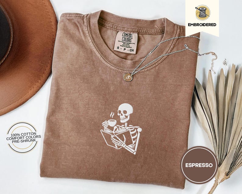 Embroidered Skeleton Reading a Book Shirt – Comfort Colors Book Lover Tee Cozy Aesthetic Embroidery Dark Academia Spooky Season Reader Shirt