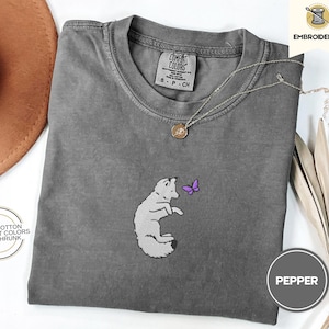 Embroidered Snow Fox Onyx Quicksilver Book Comfort Colors Tee, Fae and Alchemy Little Osha Kingfisher Shirt, Cozy Cute Tee