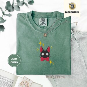 Jiji Anime Cat Embroidered Tee – Comfort Colors® Kawaii Cozy Shirt, Studio-Inspired Witchy Cat Gift, Cute Magical Familiar Tee