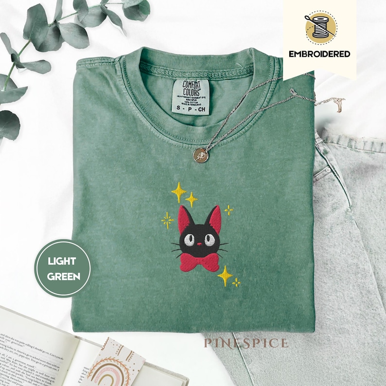 Jiji Anime Cat Embroidered Tee – Comfort Colors® Kawaii Cozy Shirt, Studio-Inspired Witchy Cat Gift, Cute Magical Familiar Tee