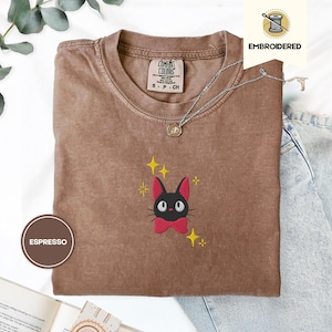 Jiji Anime Cat Embroidered Tee – Comfort Colors® Kawaii Cozy Shirt, Studio-Inspired Witchy Cat Gift, Cute Magical Familiar Tee