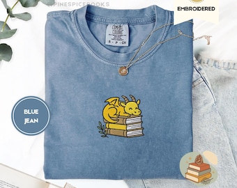 Sleeping dragon on books tee, cute fantasy t shirt, embroidered comfort colors shirt, book dragon gift, cozy reader shirt, cottagecore