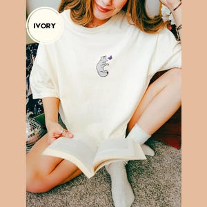 Embroidered Snow Fox Onyx Quicksilver Book Comfort Colors Tee, Fae and Alchemy Little Osha Kingfisher Shirt, Cozy Cute Tee