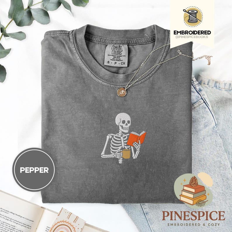 Skeleton reading book tee, embroidered skeleton coffee shirt, spooky book lover t-shirt, comfort colors 1717, fall vibes shirt, boo basket