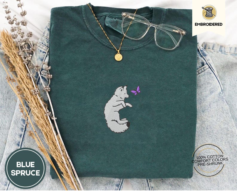 Embroidered Snow Fox Onyx Quicksilver Book Comfort Colors Tee, Fae and Alchemy Little Osha Kingfisher Shirt, Cozy Cute Tee