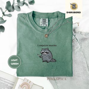 I Require Snacks Embroidered Raccoon Tee – Funny Comfort Colors® Shirt, Goblincore Animal Lover Gift, Cozy Snack Gremlin Tee