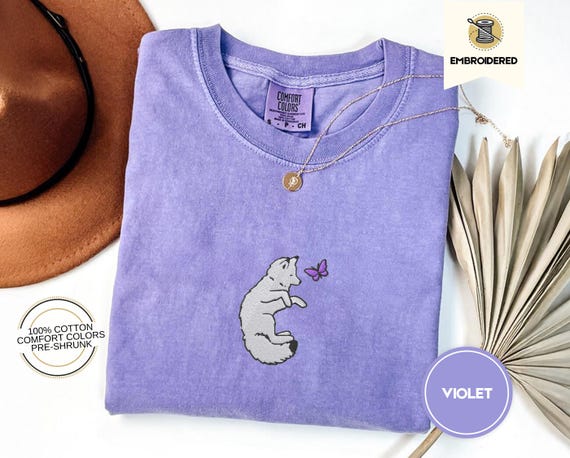 Embroidered Snow Fox Onyx Quicksilver Book Comfort Colors Tee, Fae and Alchemy Little Osha Kingfisher Shirt, Cozy Cute Tee