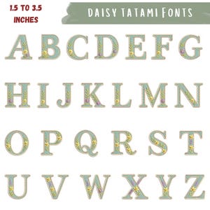 May include: A full alphabet of decorative letters, each 1.5 to 3.5 inches tall, in a light blue color with floral accents. The letters are outlined with a stitched border and feature the text "DAISY TATAMI FONTS".