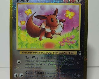 eevee 1995 pokemon card price Single Holo Card: #11 Black Star Promo that attack does nothing Eevee Scream 287/SM-P Japanese Gold