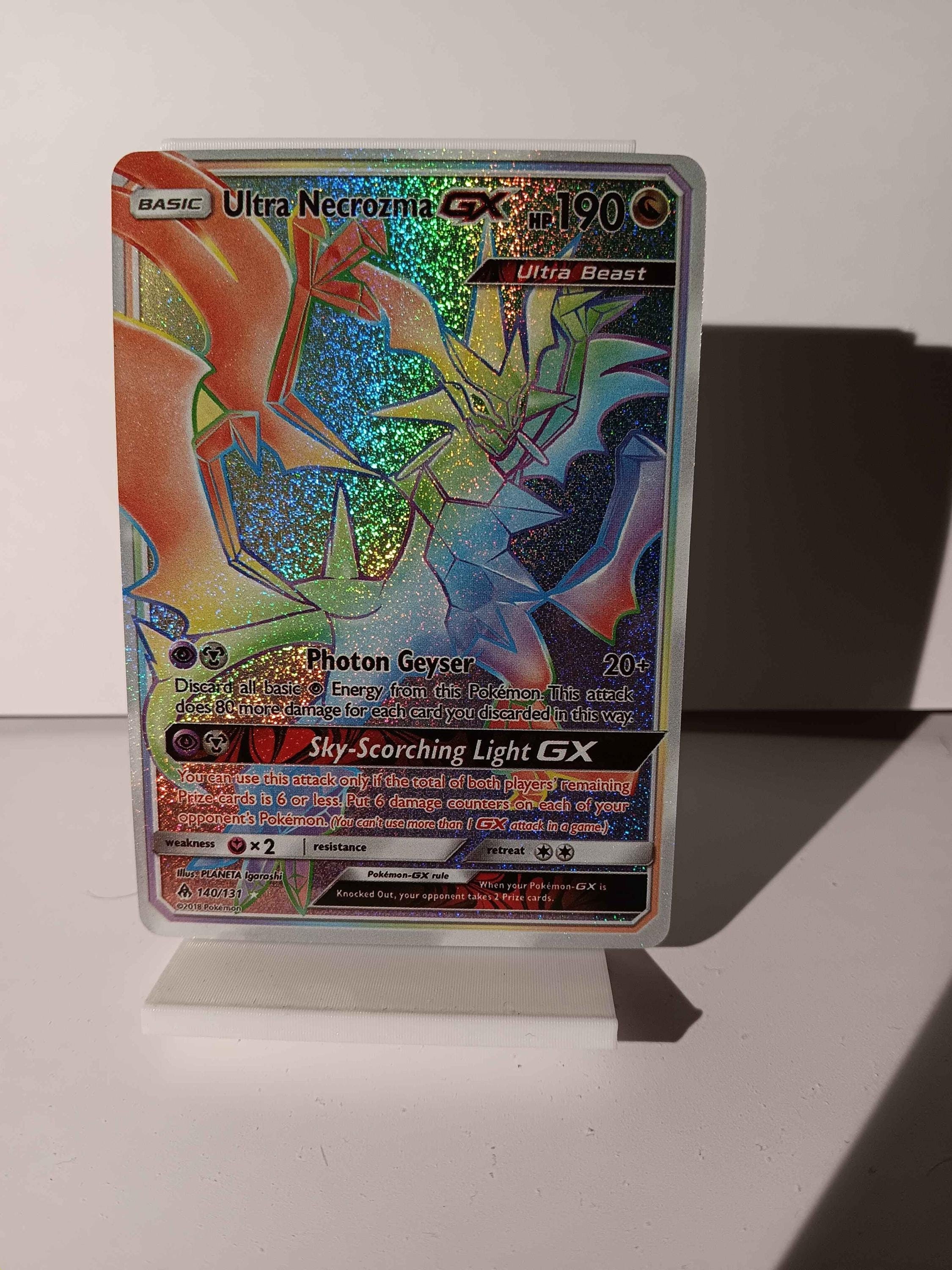 Ultra Necrozma GX - Forbidden Light - 140/131 / Secret Rare