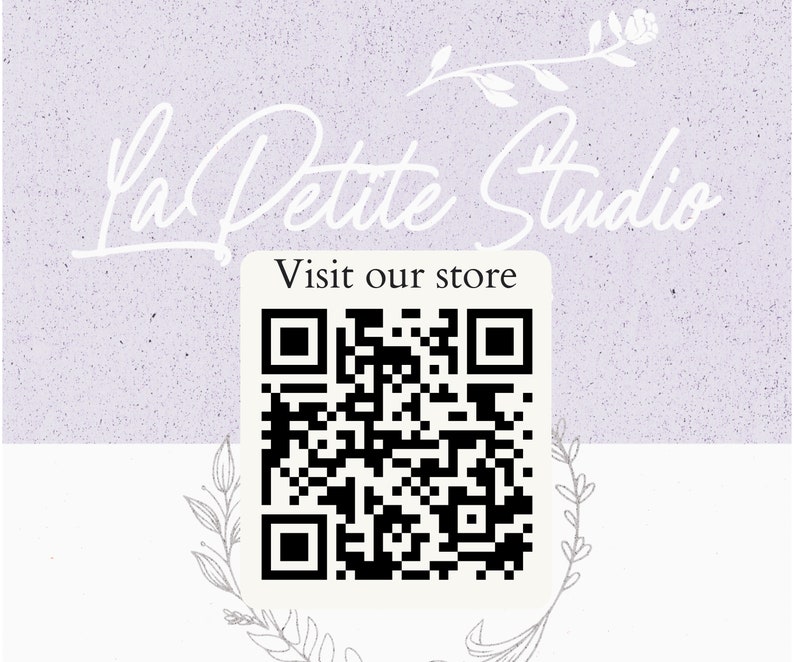 May include: A white and purple background with the text "La Petite Studio" in white cursive script. Below the text is a white square with a black QR code and the text "Visit our store" in black.