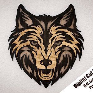 May include: A detailed, stylised illustration of a wolf's head with a black and brown colour scheme. The wolf's mouth is open, showing its teeth. The image is a digital cut file, available in Dxf, Svg, Ai, Pdf, and Cdr formats.