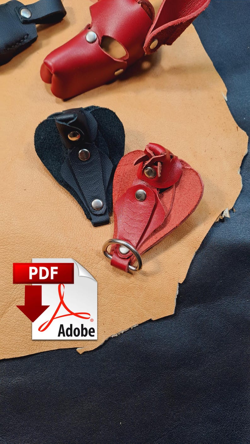 May include: A collection of leather key organisers and holders in black and red. These items feature silver-toned metal snaps and a circular metal ring for attachment. The leather pieces are shaped like teardrops and include a PDF Adobe icon.