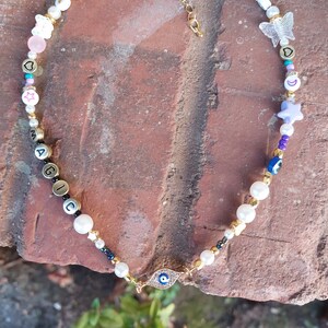 Collar mágico con brillante mal de ojo
