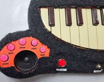 Furry circuit bent keyboard - black cat!