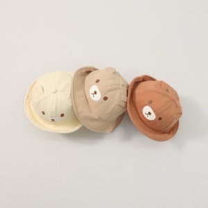 Personalized Bear Face Bucket Hat for Baby Toddler, Brim Summer Bucket Hats With Elastic Strap for Kids Age 6 - 24 Months.