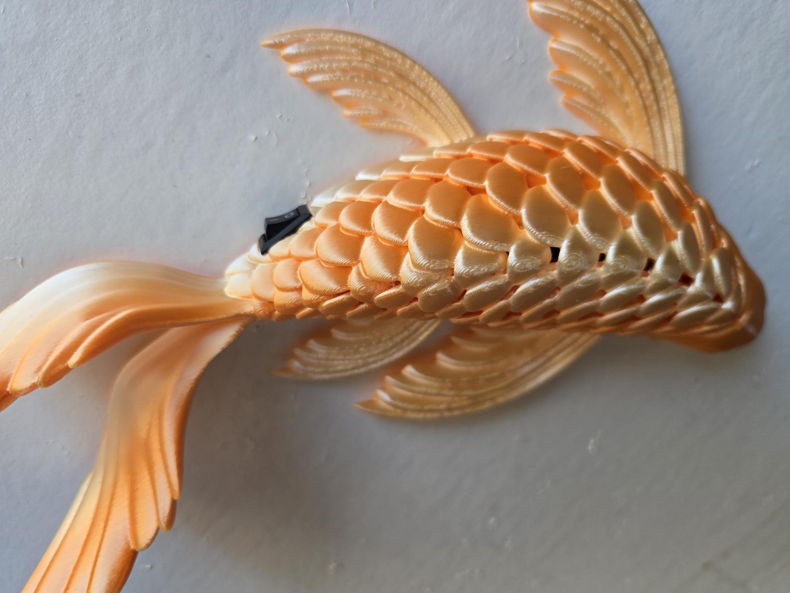 Koi Wall Lamps- (ask for in white with an orange light)
