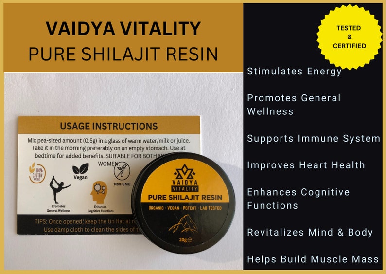 May include: A round black tin of Vaidya Vitality Pure Shilajit Resin with a yellow label, accompanied by a rectangular instruction card. The label displays the text Organic, Vegan, Potent, Lab Tested, and 20g. The card lists usage instructions.