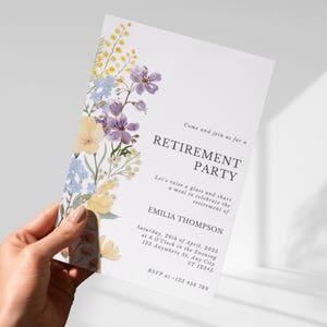 May include: A white retirement party invitation with floral accents in yellow, purple, and blue. The invitation includes the text "RETIREMENT PARTY" and details for the event, including the name "EMILIA THOMPSON".