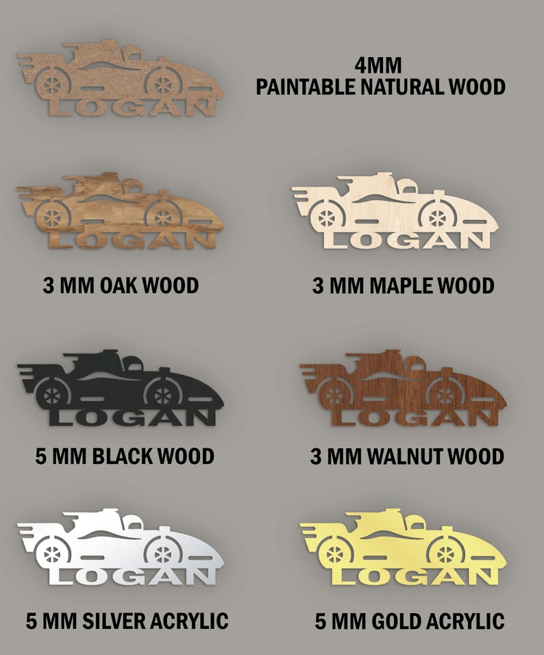 May include: A set of six personalized wooden and acrylic race car name plaques. The plaques are available in various wood types and colors, including natural wood, oak, maple, walnut, black wood, silver acrylic, and gold acrylic. The plaques are 3mm or 5mm thick and feature the name "LOGAN" in a racing font.