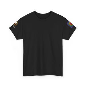 May include: A black short-sleeve t-shirt featuring a small circular logo on the right sleeve that reads WHIMSY with a small graphic, and a square rainbow-colored crochet-style pattern patch on the left sleeve. The shirt has a crew neckline.