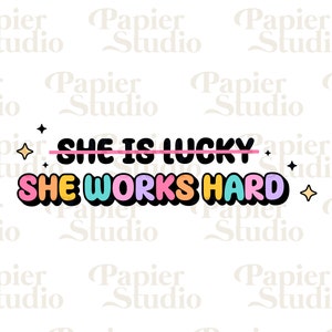 May include: A colorful graphic with the text "She is lucky" crossed out and the text "She works hard" in rainbow colors with a black outline.
