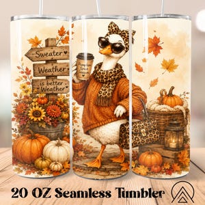 May include: A 20 oz seamless tumbler featuring a white goose wearing a brown sweater, leopard print scarf, headband, and sunglasses, holding a coffee cup labeled Pumpkin Spice Season. The design includes pumpkins, autumn leaves, and a sign reading Sweater Weather is better Weather.