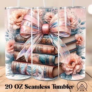 May include: A 20 oz stainless steel tumbler with a pink and white floral design. The design features a stack of vintage books with a large pink bow on top. The background is a soft pink.