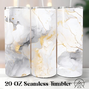 May include: Three 20 ounce stainless steel tumblers with a white and gold marble design. The tumblers are seamless and have a straw opening.