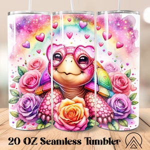 May include: A 20 oz seamless tumbler featuring a whimsical turtle wearing heart-shaped glasses, surrounded by roses and a rainbow. The design includes hearts and a watercolor background in shades of pink, purple, and blue.