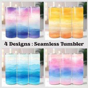Pode incluir: Quatro designs diferentes de copos de aço inoxidável com gradientes em estilo aquarela. Os designs apresentam um degradê azul e rosa, um degradê amarelo, um degradê azul e um degradê rosa e azul.