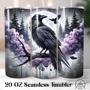 May include: A 20 oz seamless tumbler featuring a detailed illustration of a raven perched on a branch, set against a backdrop of a full moon, purple clouds, and silhouetted trees. The design includes a second raven in flight. The tumbler has a white straw.