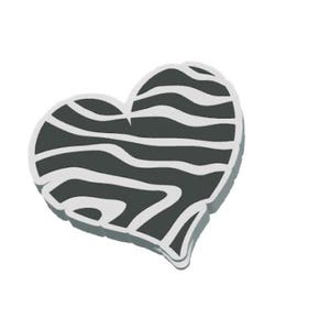 Op de afbeelding: Een hartvormig ontwerp met een zwart-wit zebraprintpatroon. Het hart heeft een witte omtrek en een schaduweffect, tegen een effen witte achtergrond.