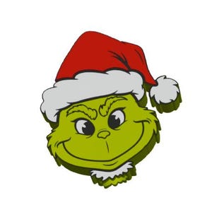 May include: A green cartoon character's face with a mischievous grin, wearing a red Santa hat with white trim. The character has yellow eyes and a white beard, set against a white background. A festive holiday design.