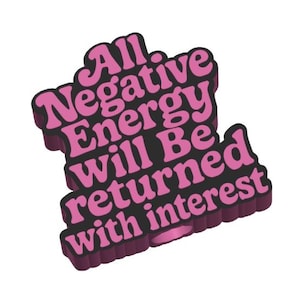 May include: A 3D-style graphic with the text "All Negative Energy Will Be returned with interest" in pink and black. The text is in a bold, retro font, and the overall design has a playful, vintage aesthetic.