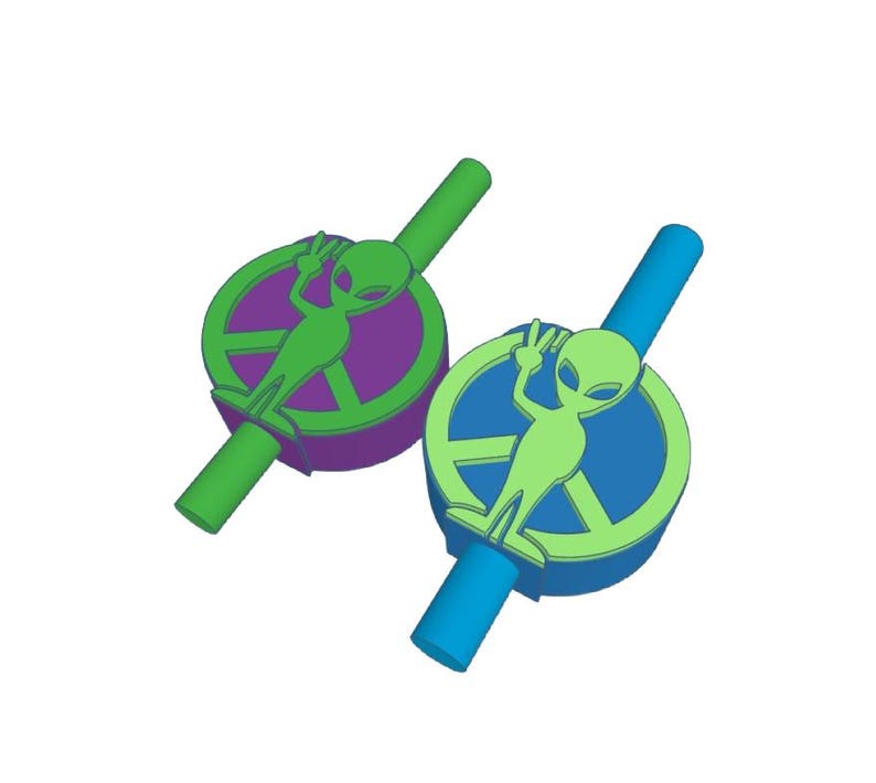 May include: Two green alien figures with peace signs on their heads are attached to green and blue drinking straws. The straws are decorated with peace signs and the aliens are green.
