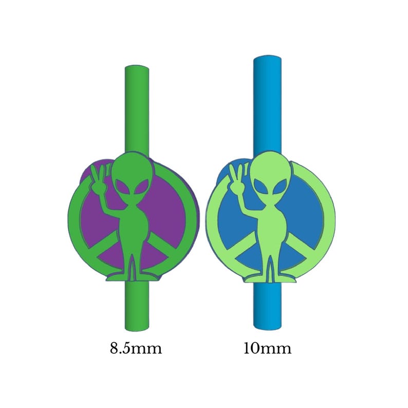 May include: Two green alien peace sign straw toppers. The left topper is 8.5 mm and has a purple peace sign. The right topper is 10 mm and has a blue peace sign.