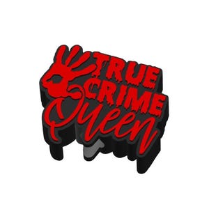 May include: A black and red shoe charm with the text "TRUE CRIME Queen". The charm features a red handprint and a dripping effect on the text. The design is 3D and has a shadow effect.