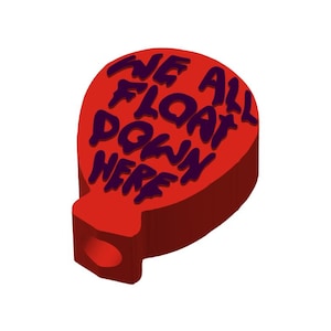 May include: Red balloon with the text "We all float down here" written in purple.