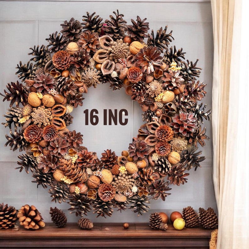 May include: A 16 inch brown and gold pine cone wreath with natural elements like nuts, berries, and dried flowers.